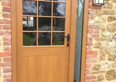 Oak front door with brick surround