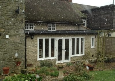 White timber patio doors external view